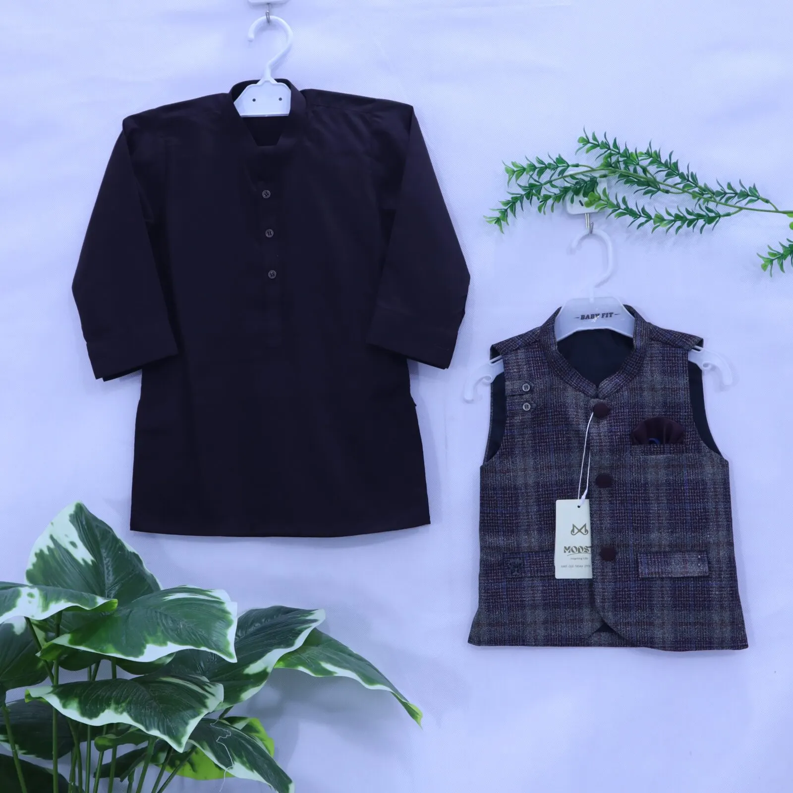 Boys Black Kurta & Plaid Waistcoat Set from MODST Kidswear